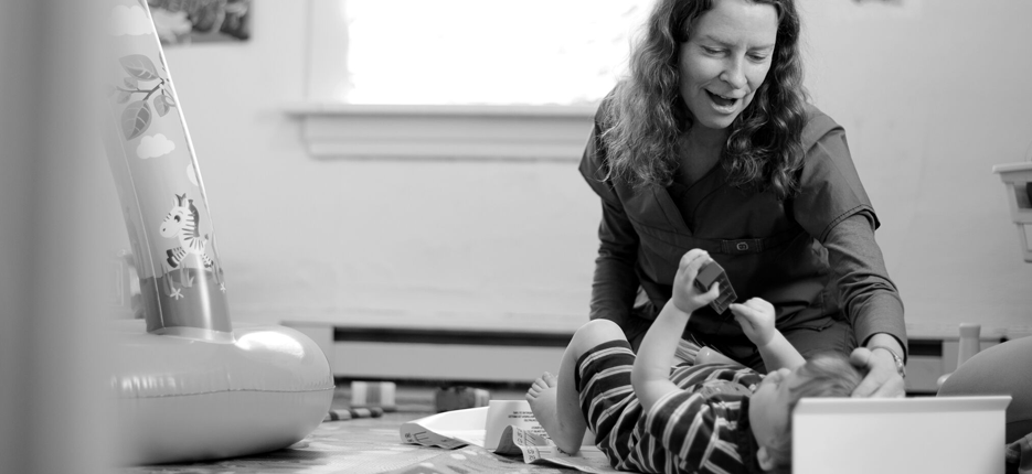 Image of nurse and infant Image of nurse and infant